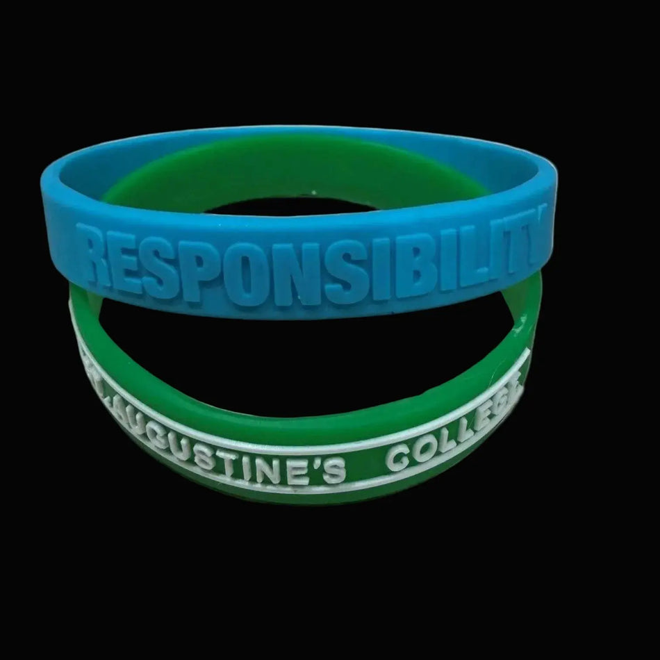 Custom embossed silicone wristbands with raised tone-on-tone lettering - Dynamic Gift